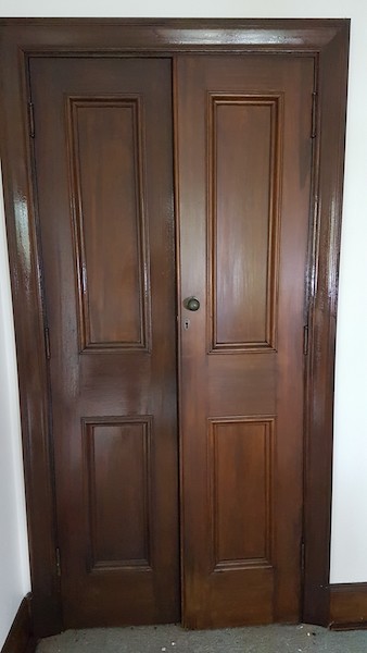 Old style timber doors with dark stain- after.
