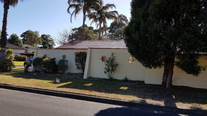 Exterior wall showing durable paint finish after years of weather exposure