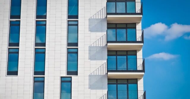 Low-angle Photography of Gray Concrete Building.