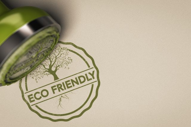 An eco friendly stamp in a brown background.