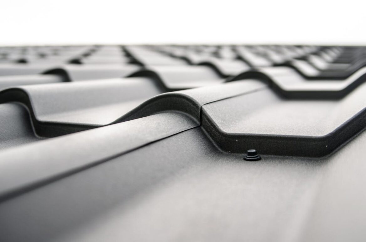 A roof made out of gray iron sheets.