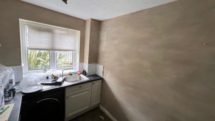 Lime wash wall in a kitchen that is under renovation.