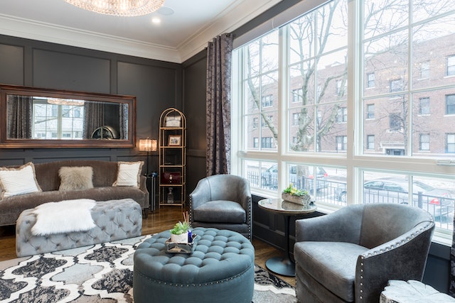 Perfectly proportioned living room with gray sofas and couches.