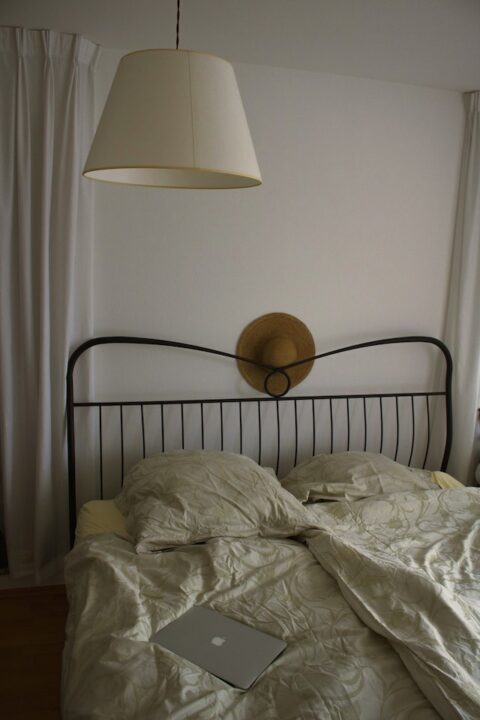 Newly painted metal headboard of a bed.