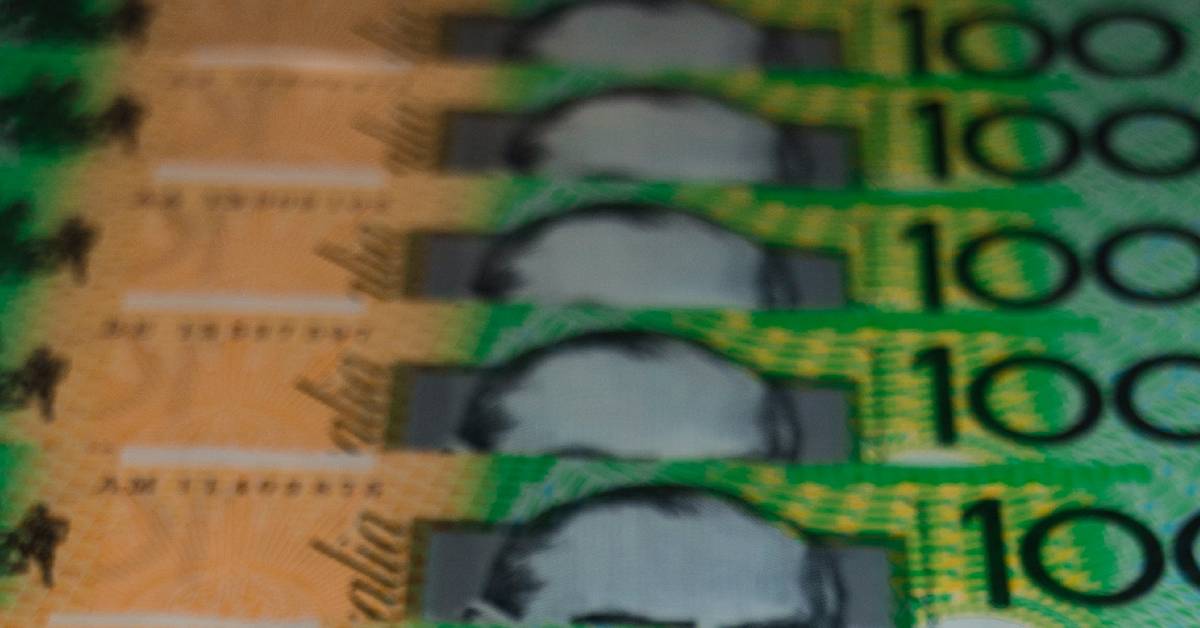 A line of 100 dollar Australinan banknotes.