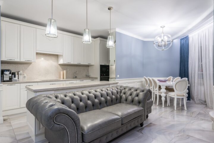 A home interior with a light blue accent wall for dining area.